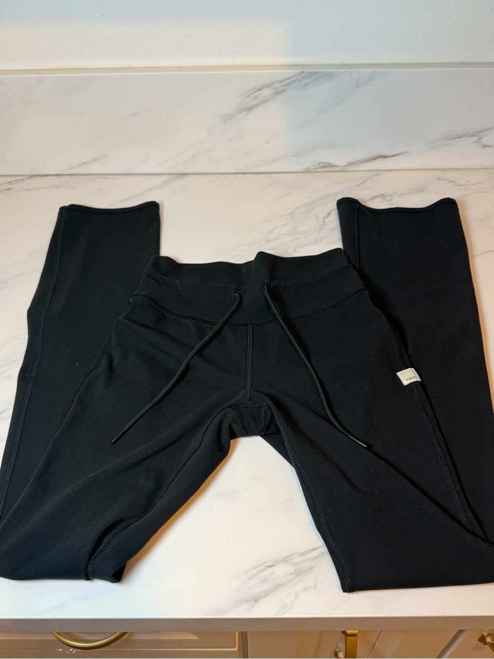 Vuori black wide flared cut out leggings